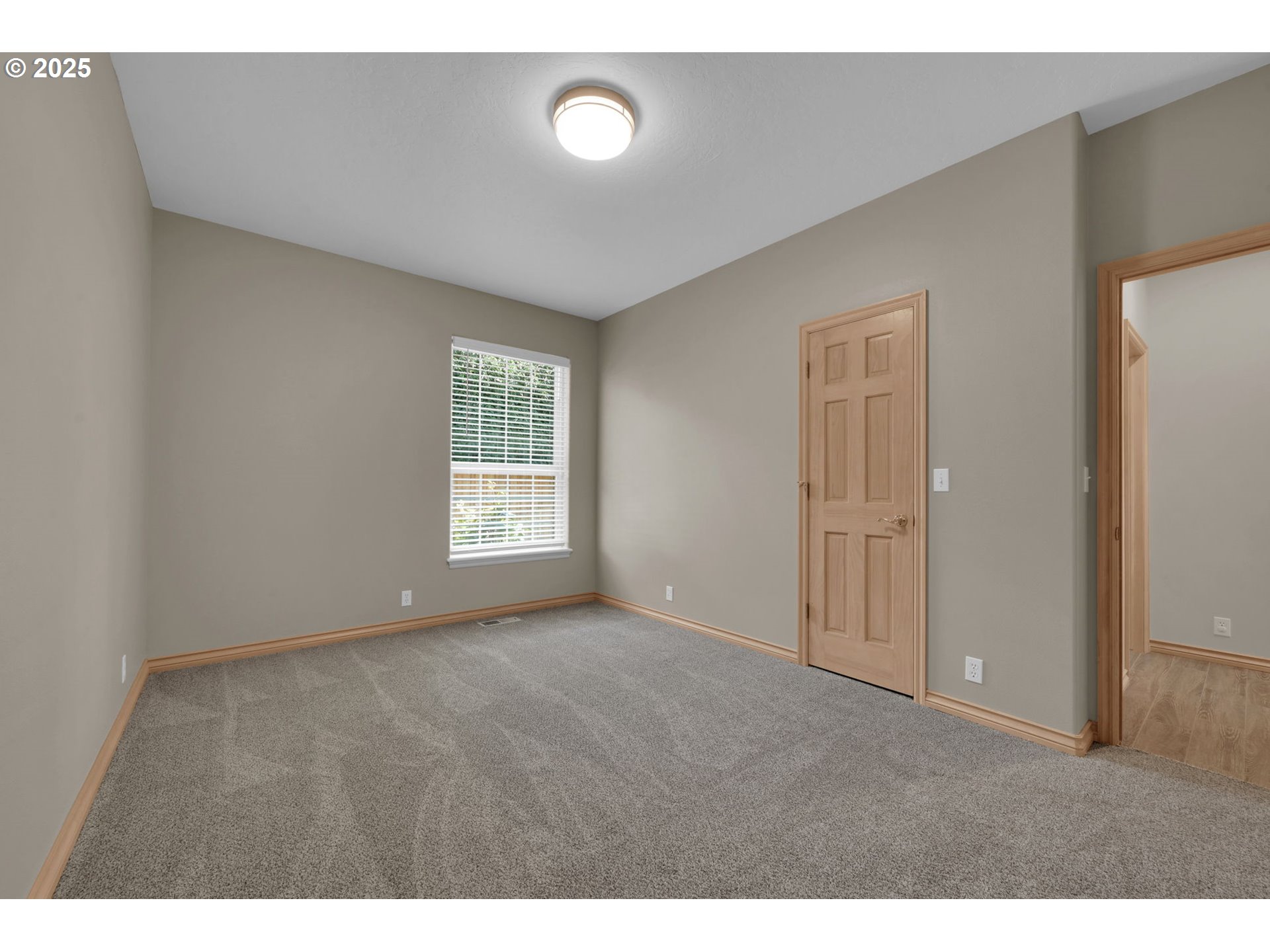 1417 Wimbledon Place Springfield, OR 97477 - Photo 27 of 48 a view of an empty room with a window
