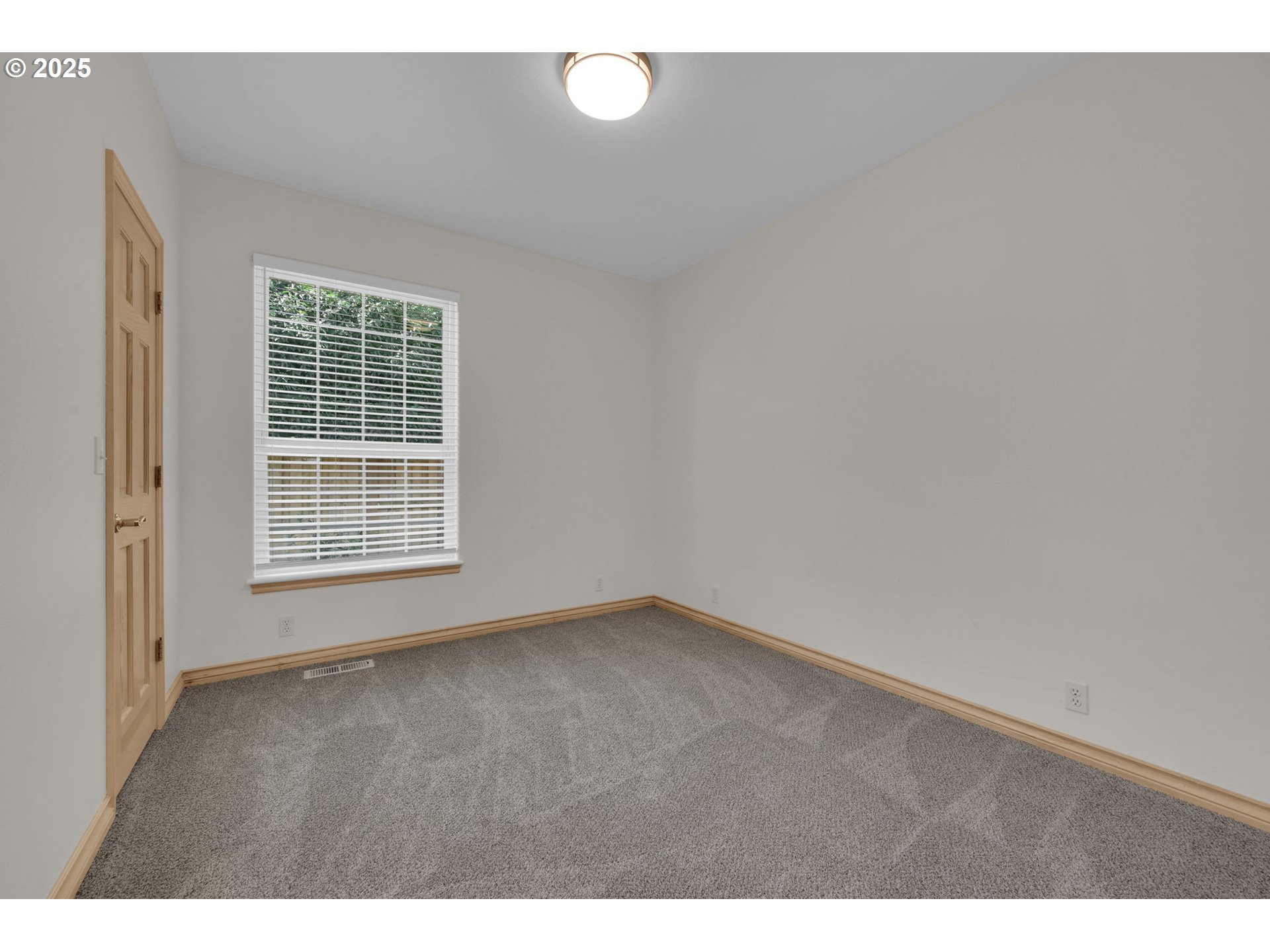 1417 Wimbledon Place Springfield, OR 97477 - Photo 28 of 48 a view of an empty room with a window