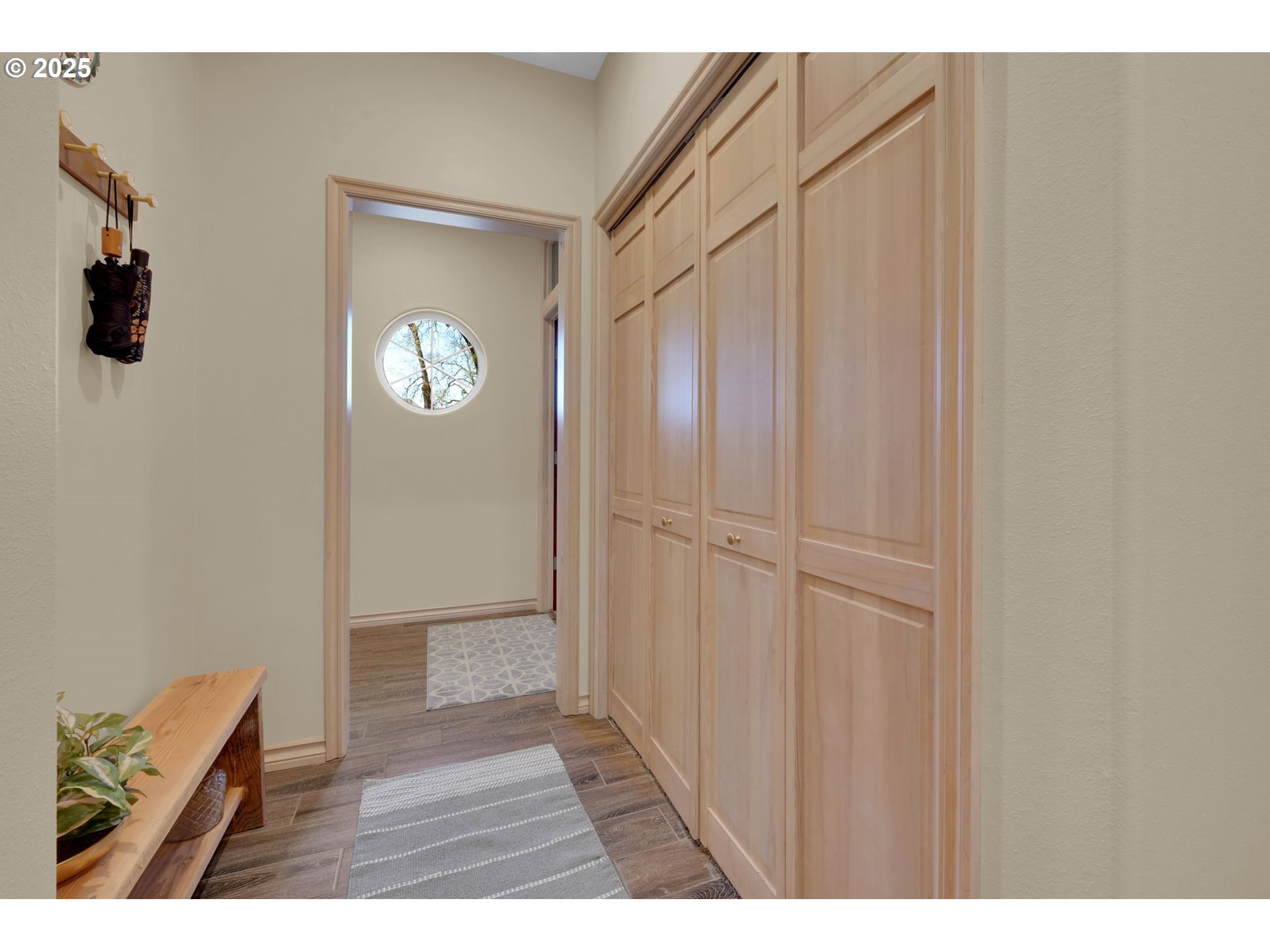 1417 Wimbledon Place Springfield, OR 97477 - Photo 31 of 48 a view of an entryway with wooden floor
