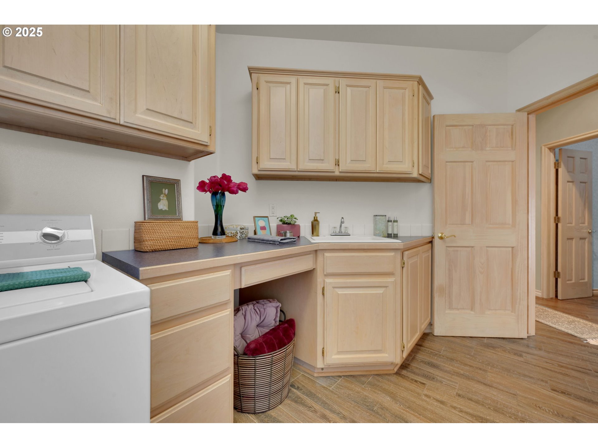 1417 Wimbledon Place Springfield, OR 97477 - Photo 44 of 48 a utility room with cabinets washer and dryer