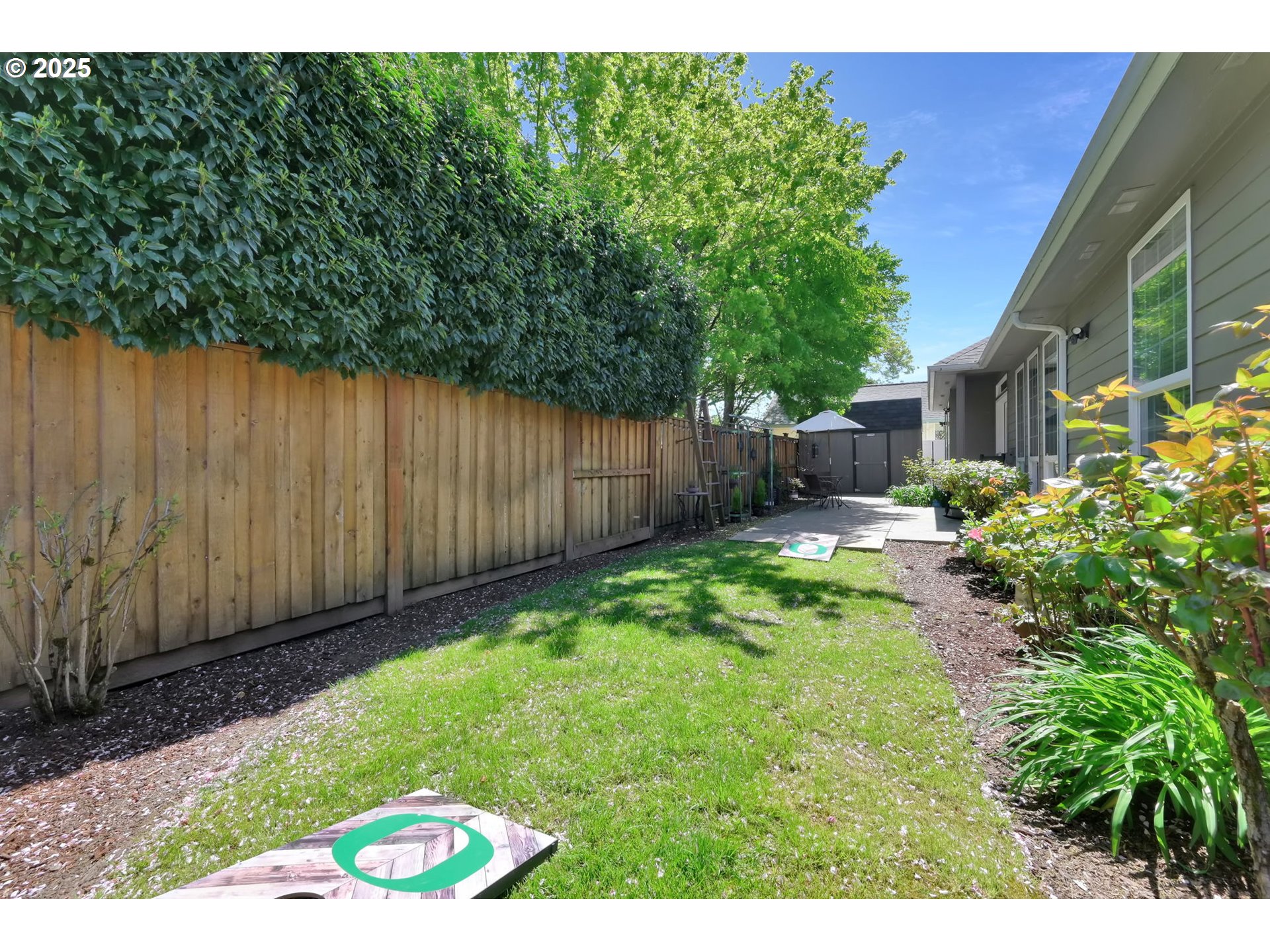 1417 Wimbledon Place Springfield, OR 97477 - Photo 46 of 48 a backyard of a house with lots of green space