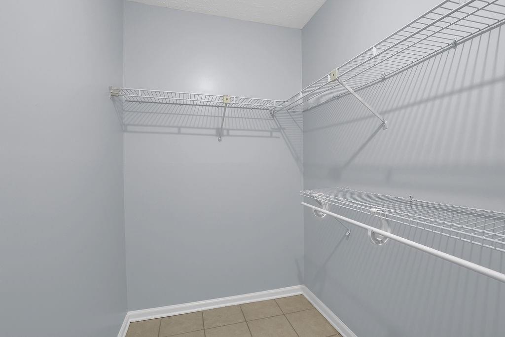 1424 Springleaf Circle Southeast Smyrna, GA 30080 - Photo 35 of 38 a view of a room with racks on the wall