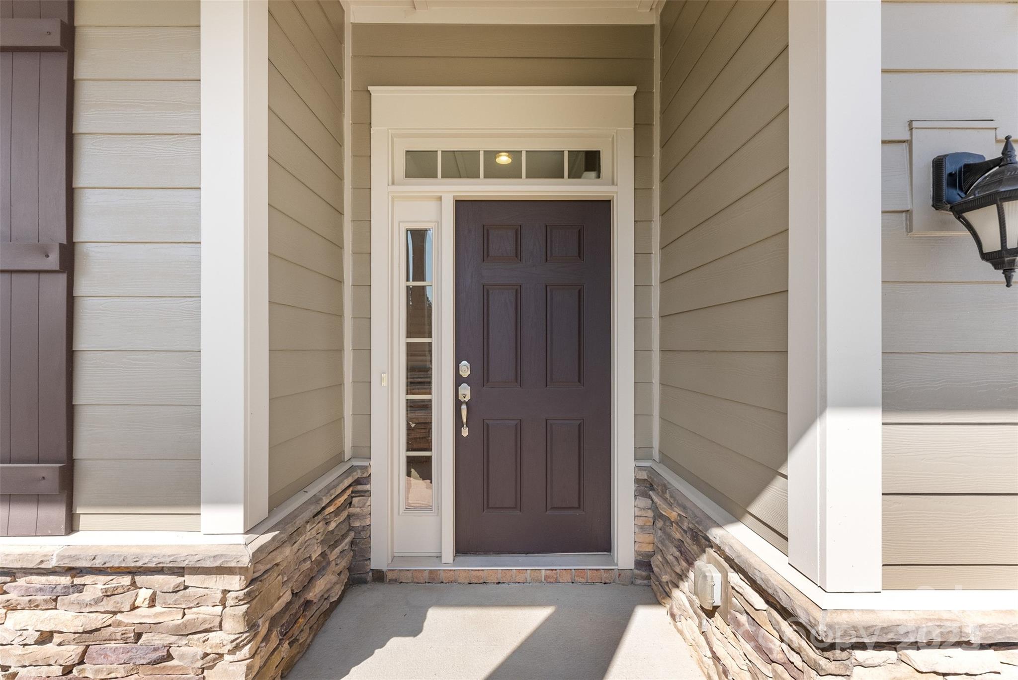 11037 Thornbeck Lane Midland, NC 28107 - Photo 15 of 46 a view of front door of house