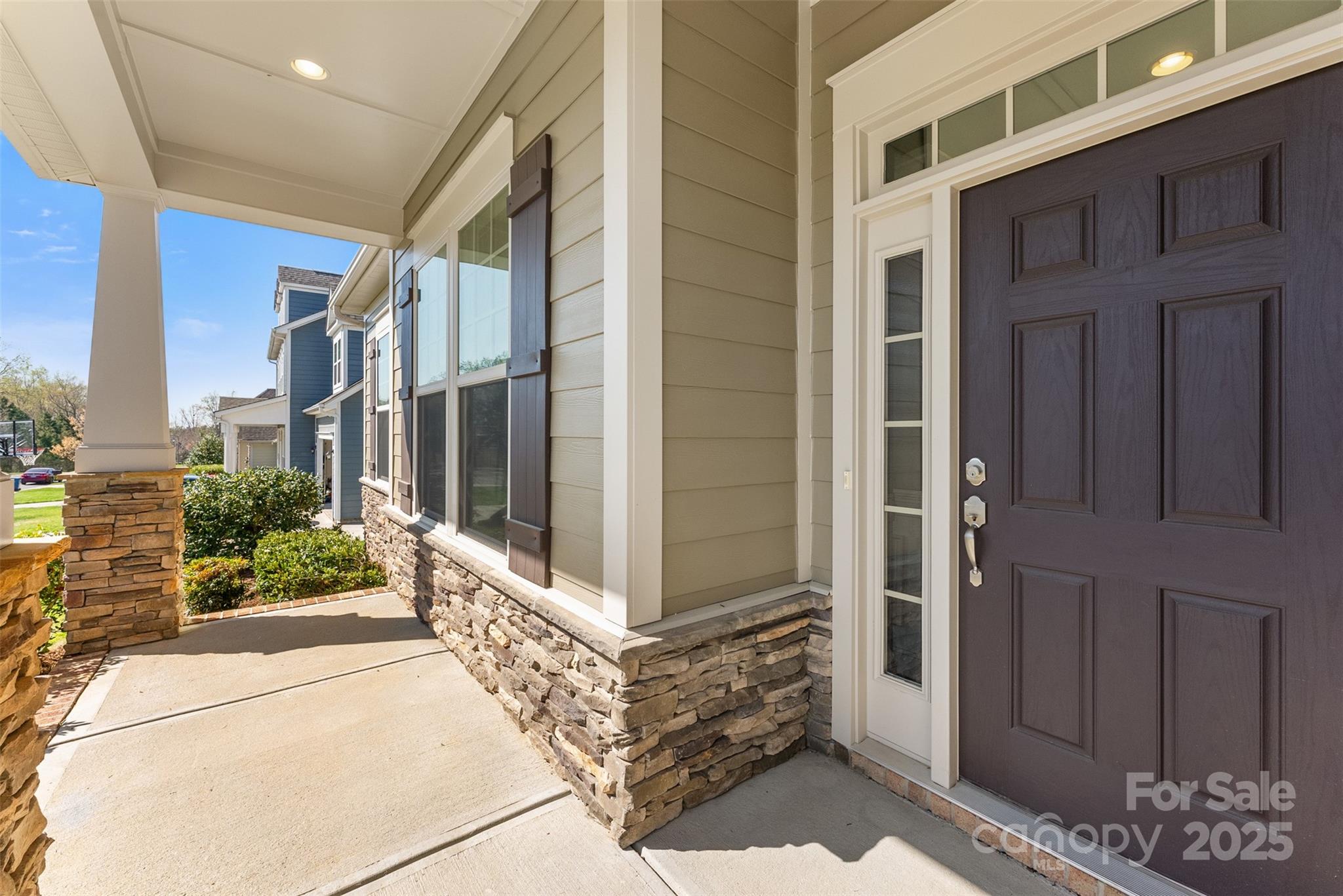 11037 Thornbeck Lane Midland, NC 28107 - Photo 16 of 46 a view of a brick house with a large windows