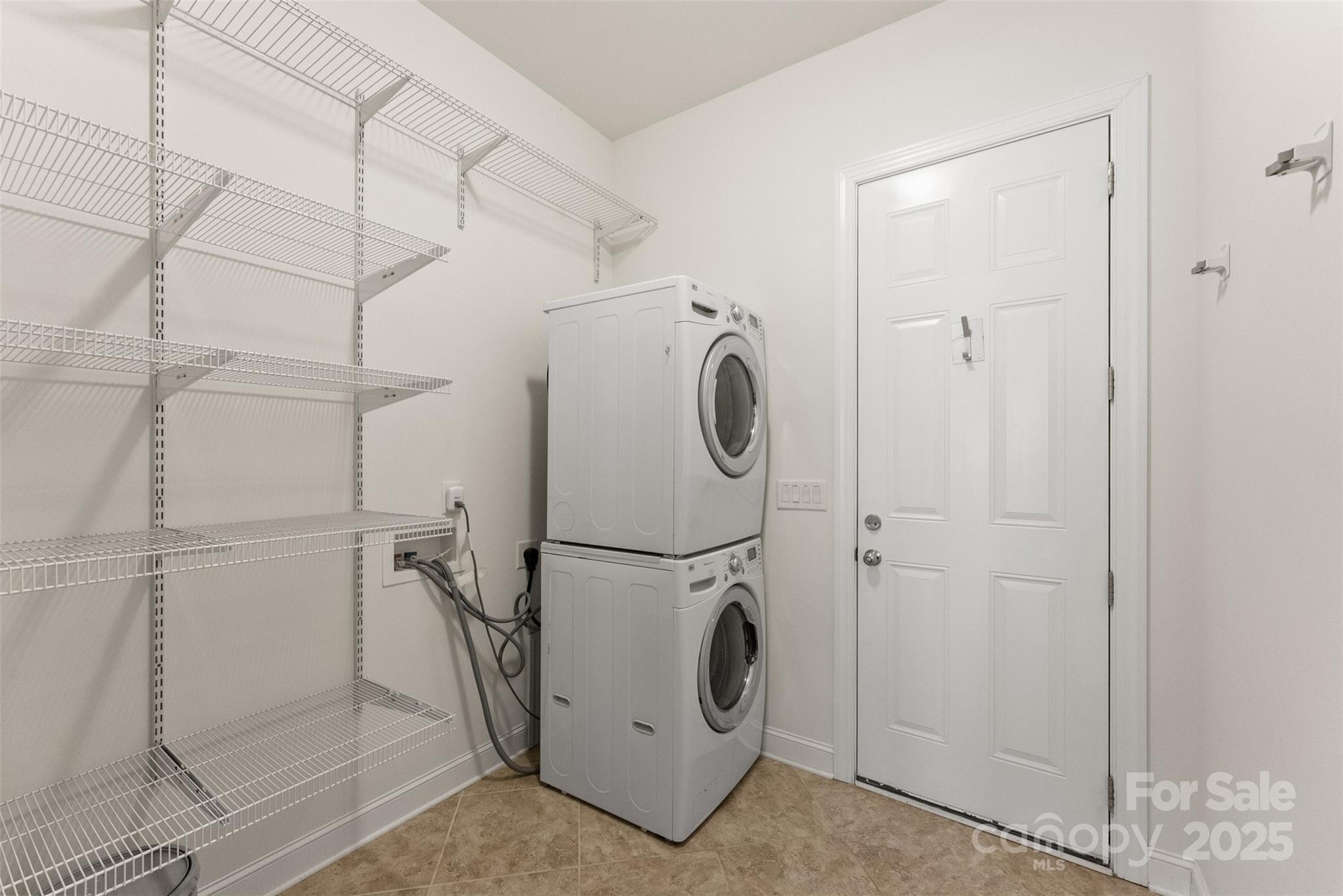 11037 Thornbeck Lane Midland, NC 28107 - Photo 23 of 46 a utility room with dryer and washer