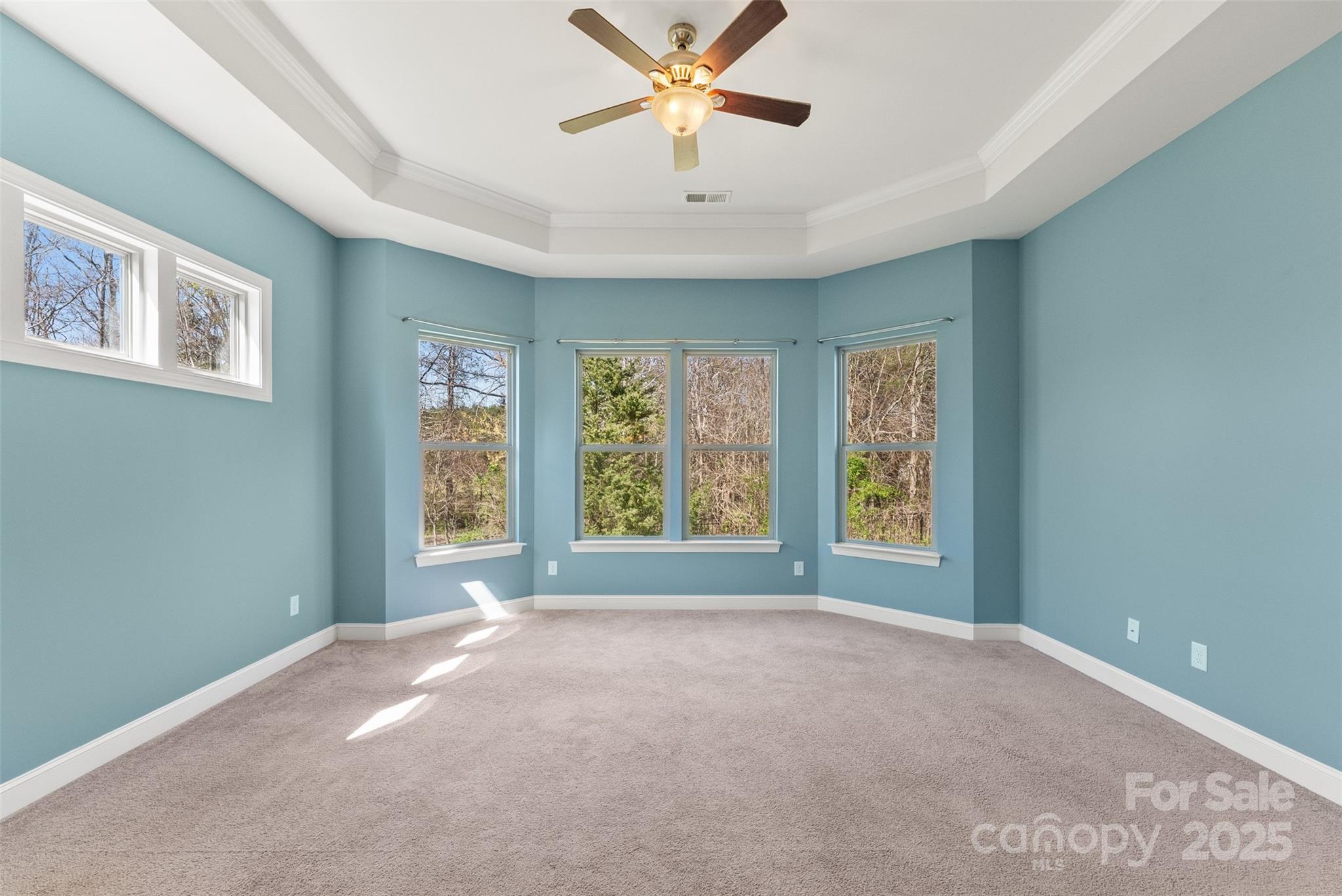 11037 Thornbeck Lane Midland, NC 28107 - Photo 24 of 46 a view of a livingroom with a ceiling fan and window