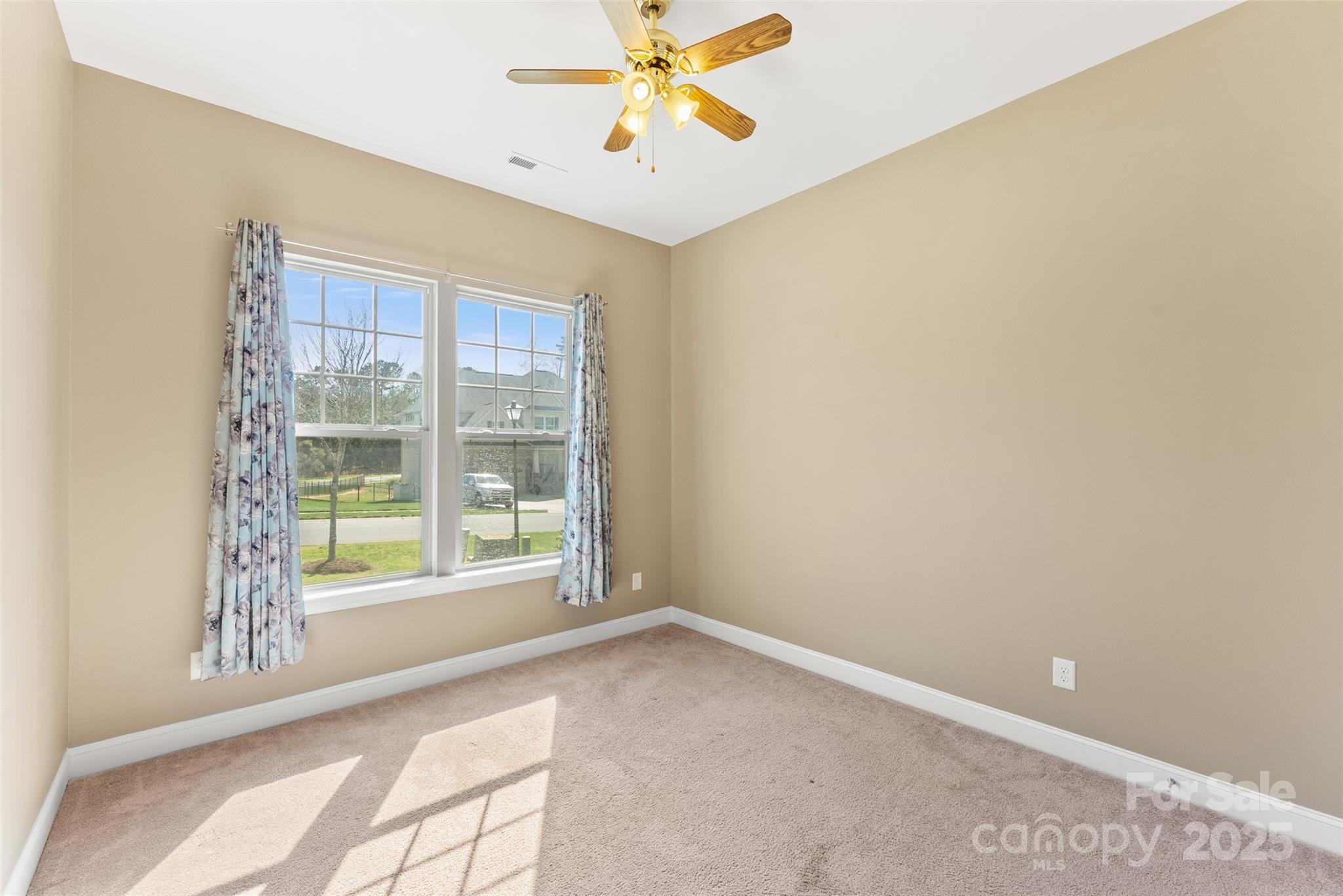 11037 Thornbeck Lane Midland, NC 28107 - Photo 30 of 46 a view of an empty room with a window