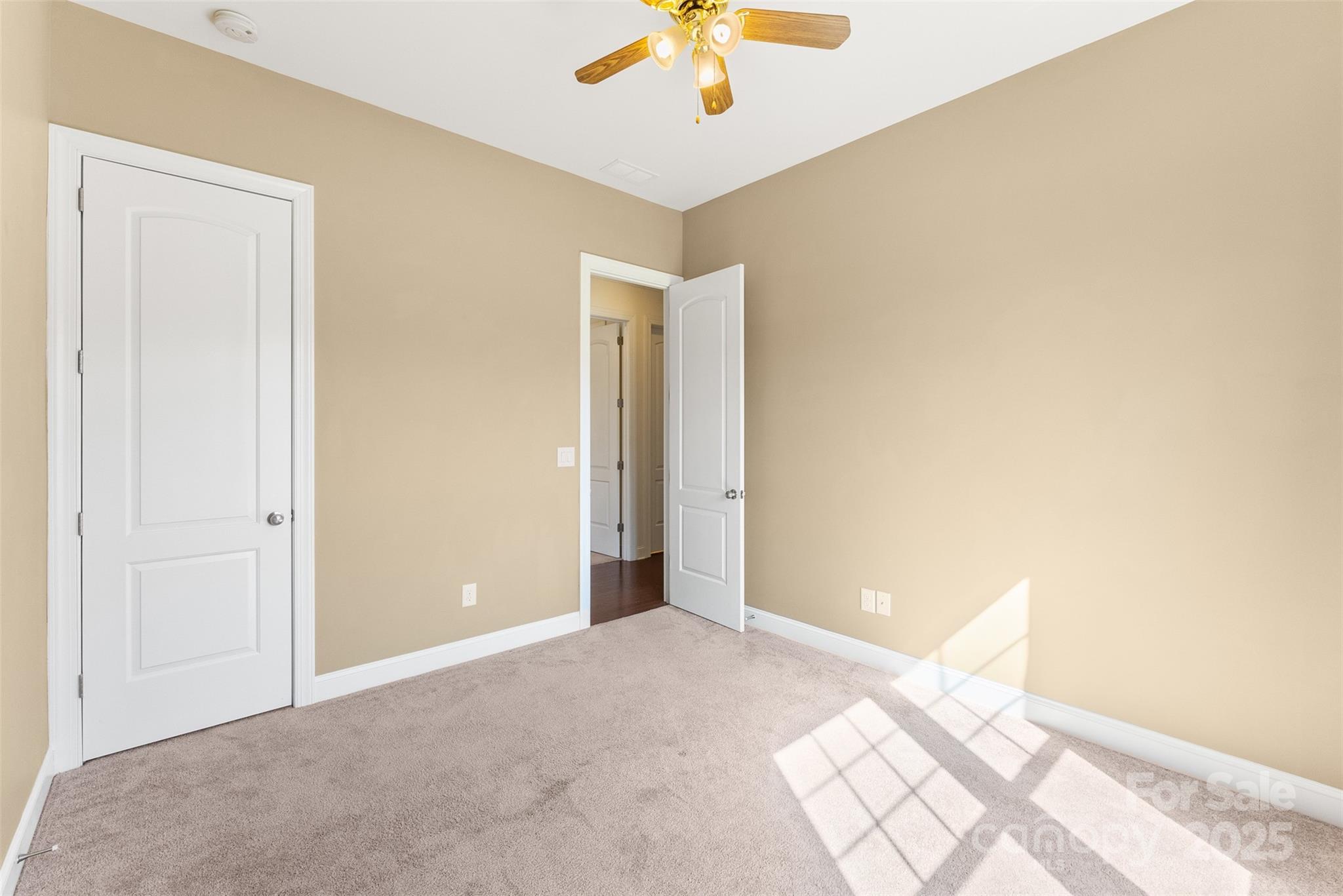 11037 Thornbeck Lane Midland, NC 28107 - Photo 31 of 46 a view of a livingroom with a chandelier fan