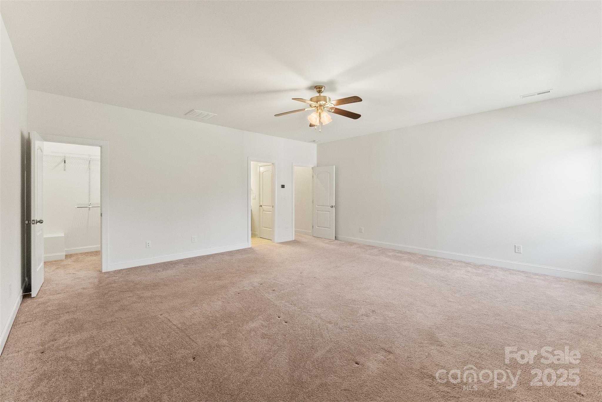 11037 Thornbeck Lane Midland, NC 28107 - Photo 37 of 46 a view of an empty room with a fan