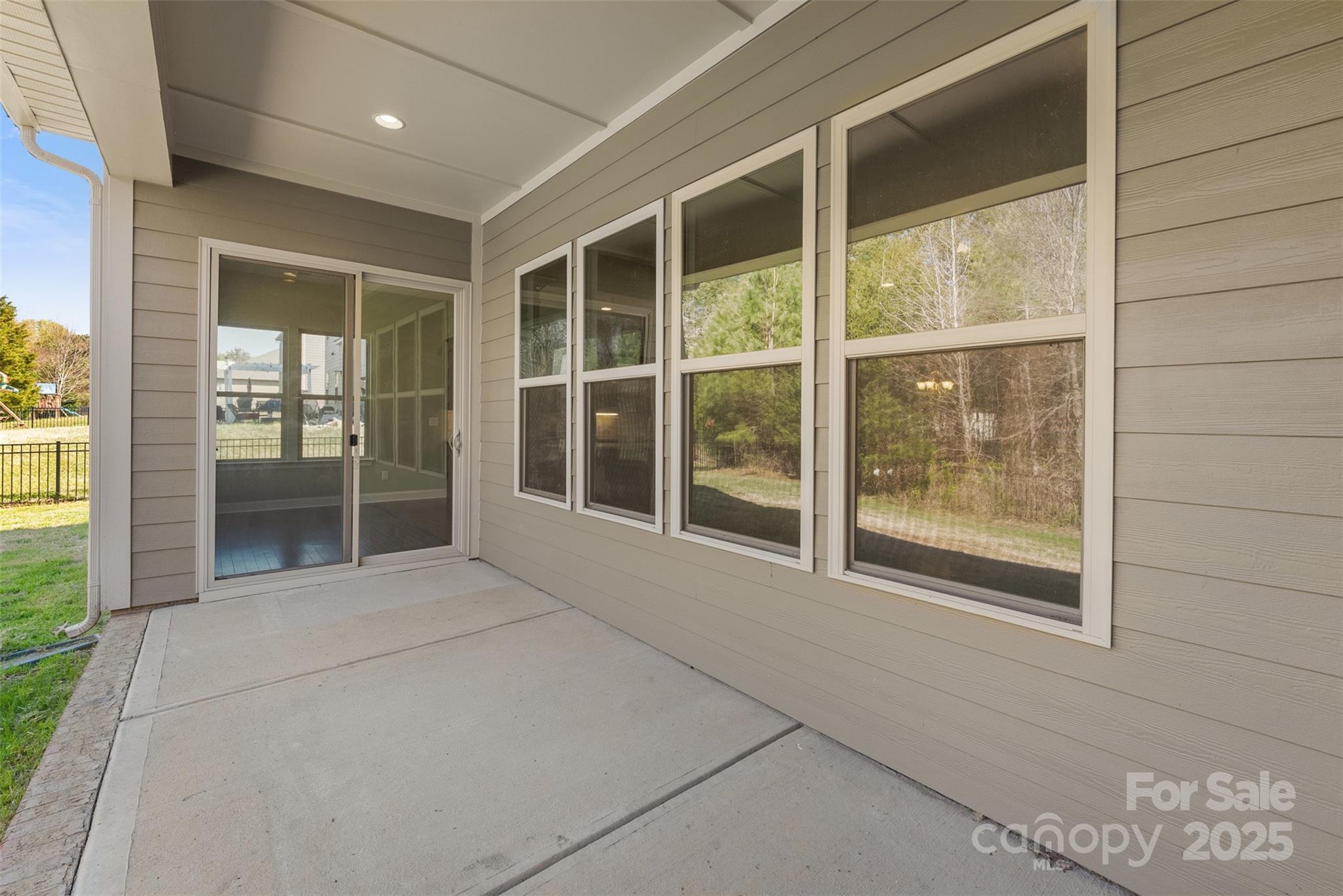 11037 Thornbeck Lane Midland, NC 28107 - Photo 39 of 46 a view of an empty room with a balcony