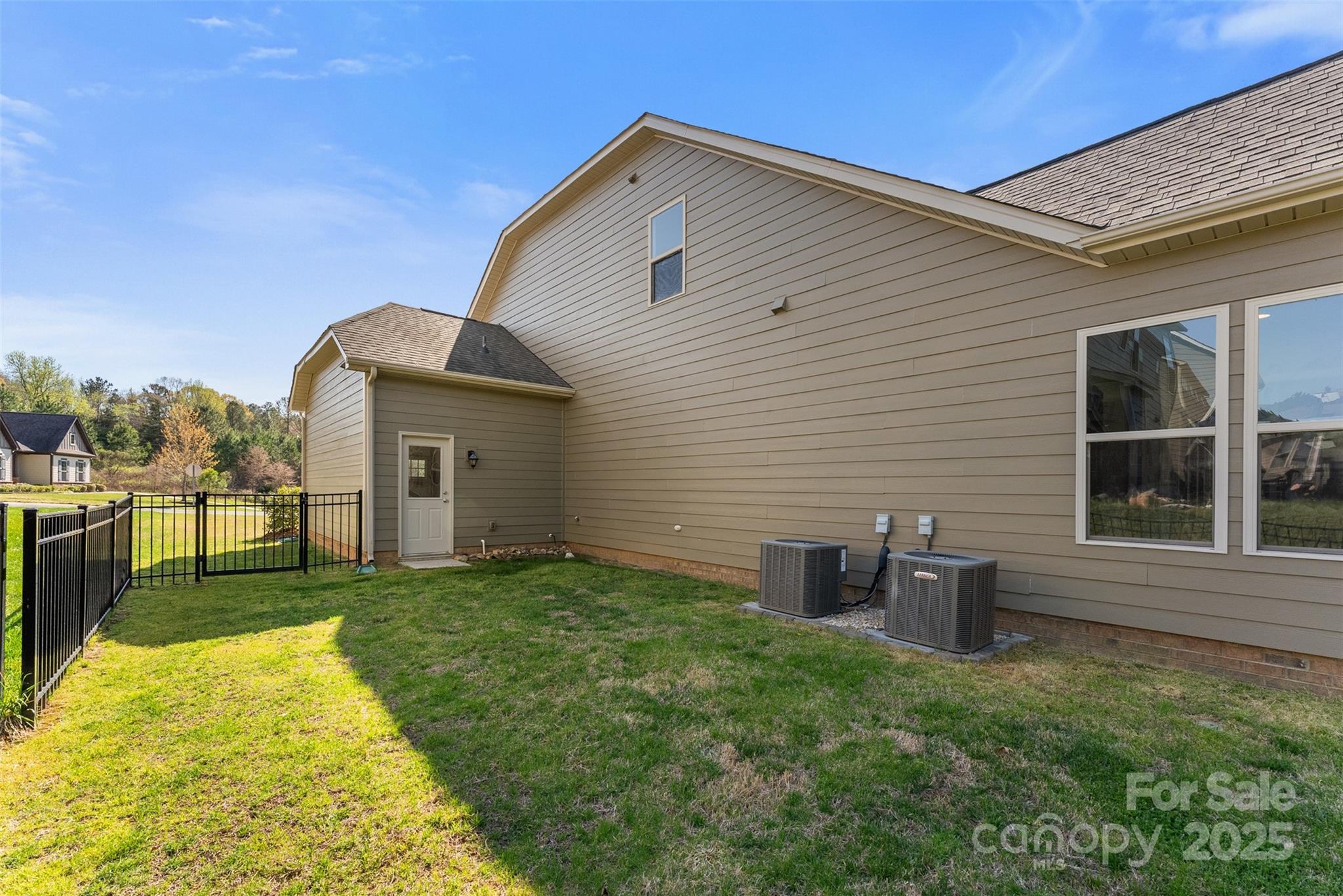 11037 Thornbeck Lane Midland, NC 28107 - Photo 40 of 46 a front view of a house with a yard
