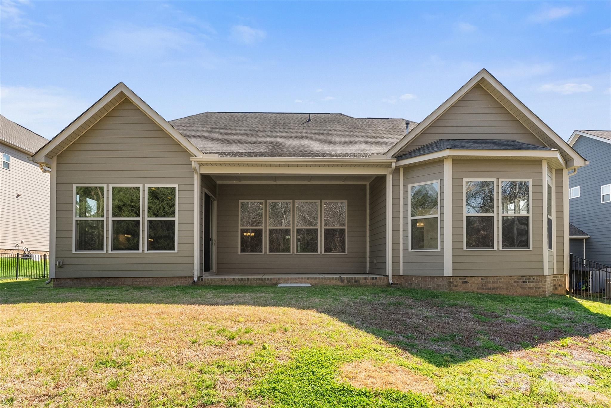 11037 Thornbeck Lane Midland, NC 28107 - Photo 41 of 46 front view of a house with a yard