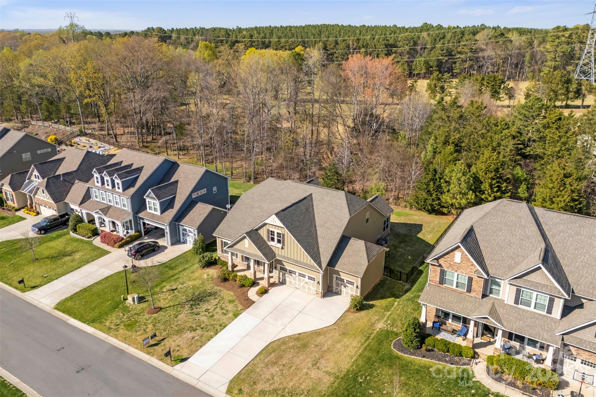 11037 Thornbeck Lane Midland, NC 28107 - Photo 42 of 46 an aerial view of a house with swimming pool and lake view