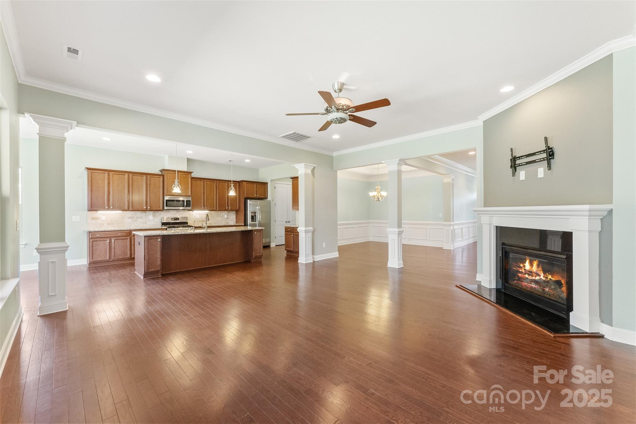 11037 Thornbeck Lane Midland, NC 28107 - Photo 6 of 46 a view of a kitchen with a sink and a fireplace