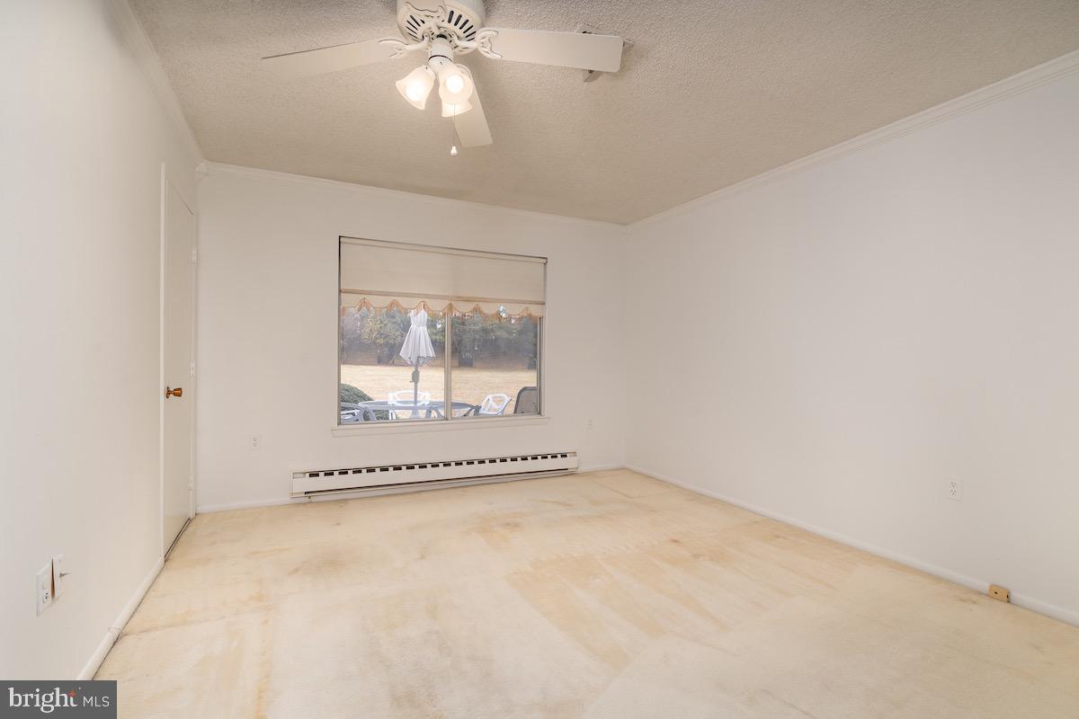 3507 Tarkington Lane, Unit 66A Silver Spring, MD 20906 - Photo 11 of 39 an empty room with a window