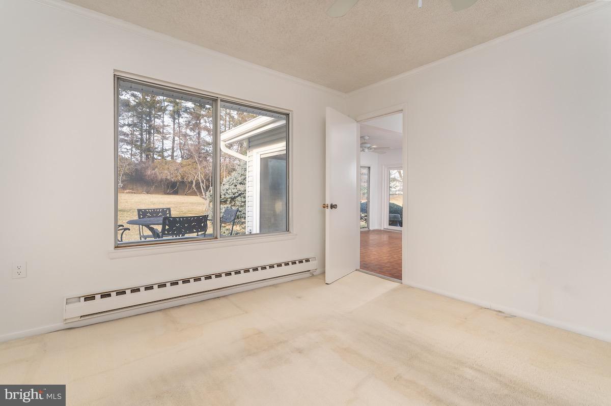 3507 Tarkington Lane, Unit 66A Silver Spring, MD 20906 - Photo 19 of 39 a view of an empty room with a window