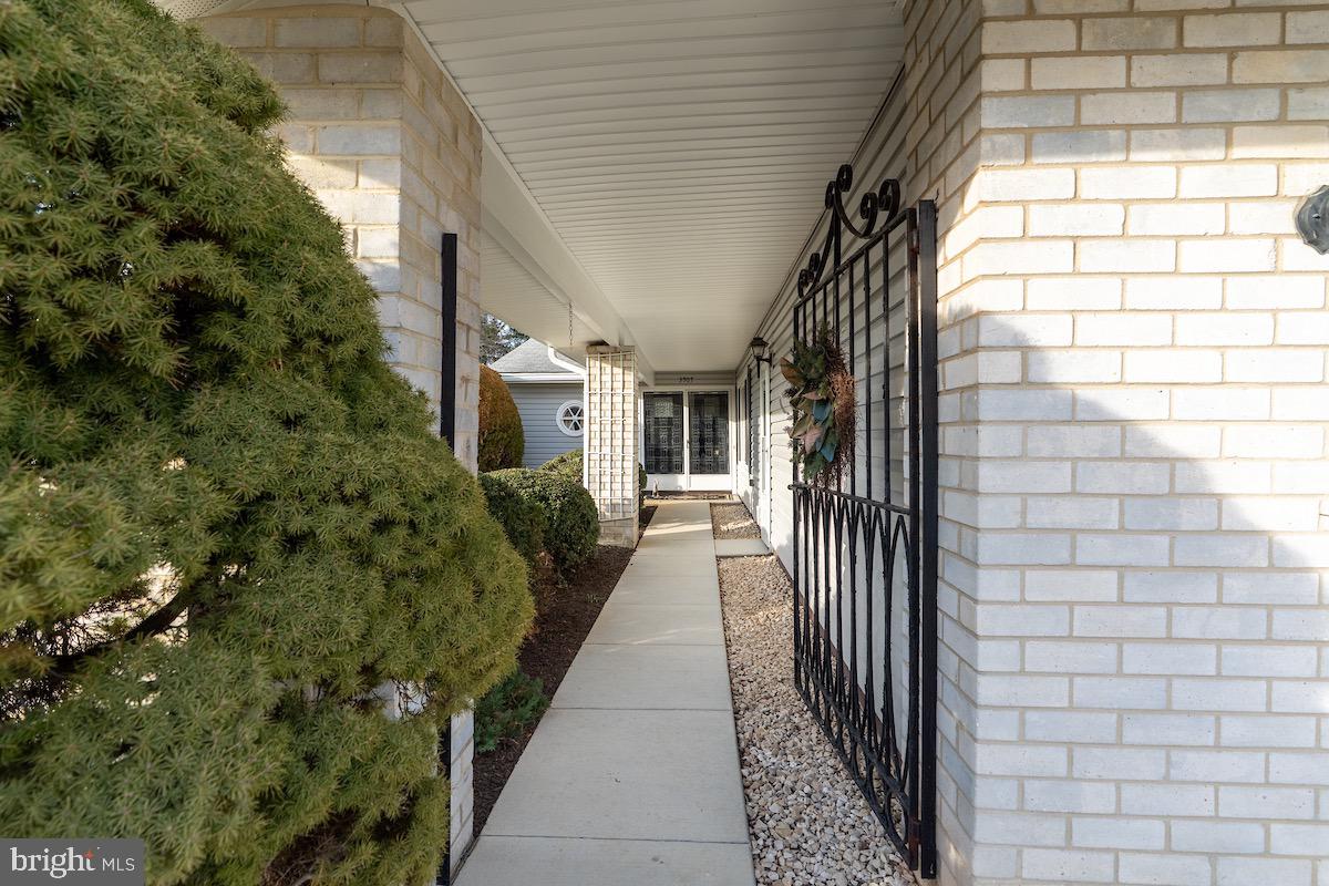 3507 Tarkington Lane, Unit 66A Silver Spring, MD 20906 - Photo 2 of 39 a view of a pathway both side of house