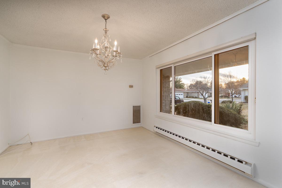 3507 Tarkington Lane, Unit 66A Silver Spring, MD 20906 - Photo 30 of 39 a view of an empty room with a window