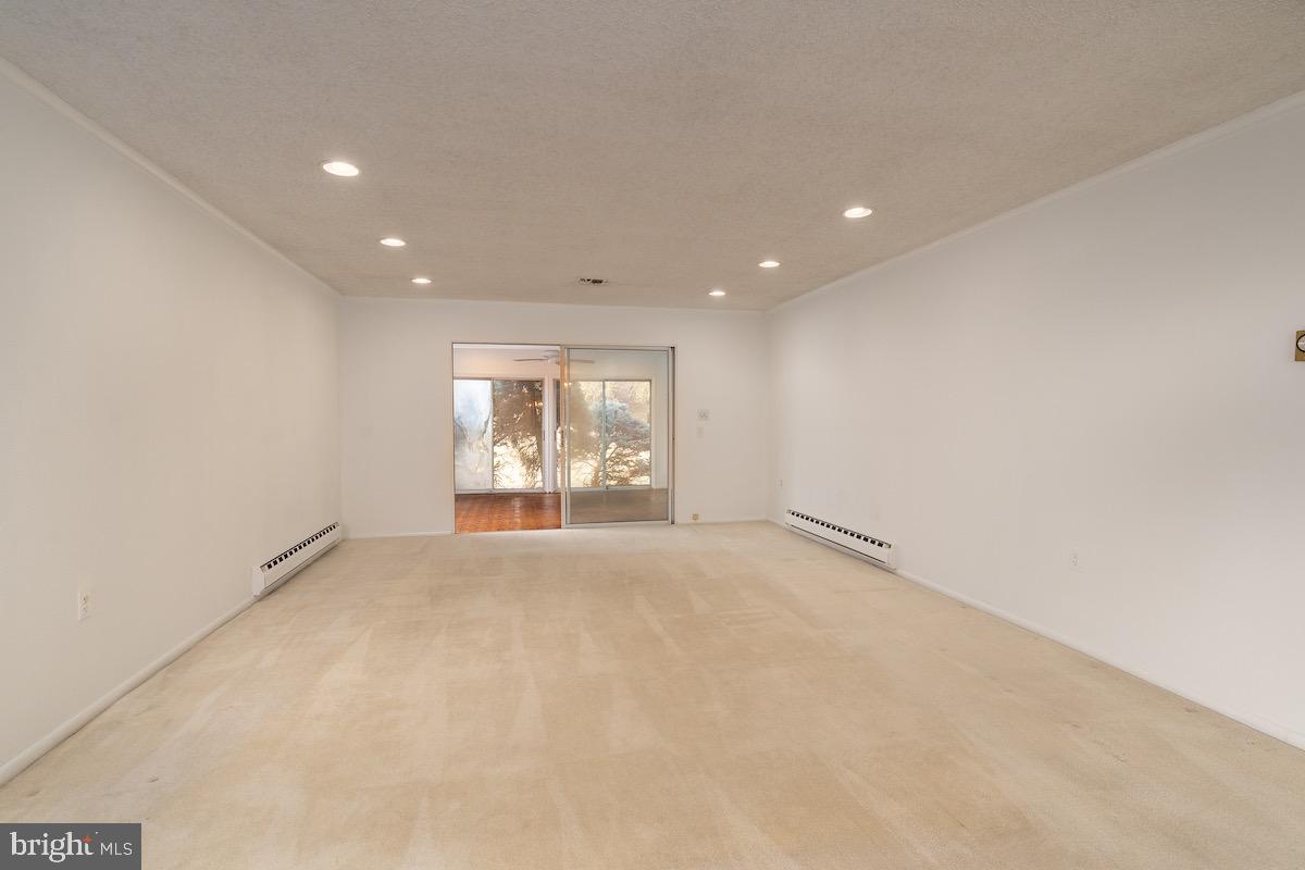 3507 Tarkington Lane, Unit 66A Silver Spring, MD 20906 - Photo 10 of 39 an empty room with windows