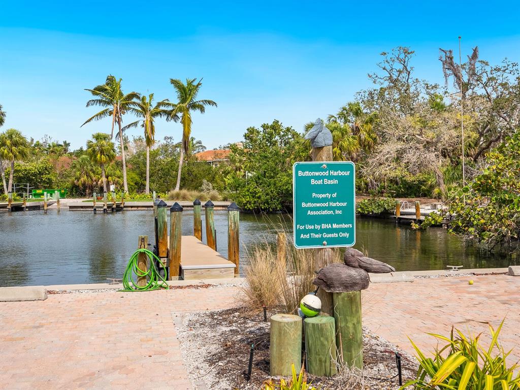 615 Buttonwood Drive Longboat Key, FL 34228 - Photo 14 of 43 a lake view