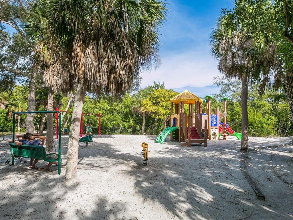 615 Buttonwood Drive Longboat Key, FL 34228 - Photo 31 of 43 a view of park with palm trees