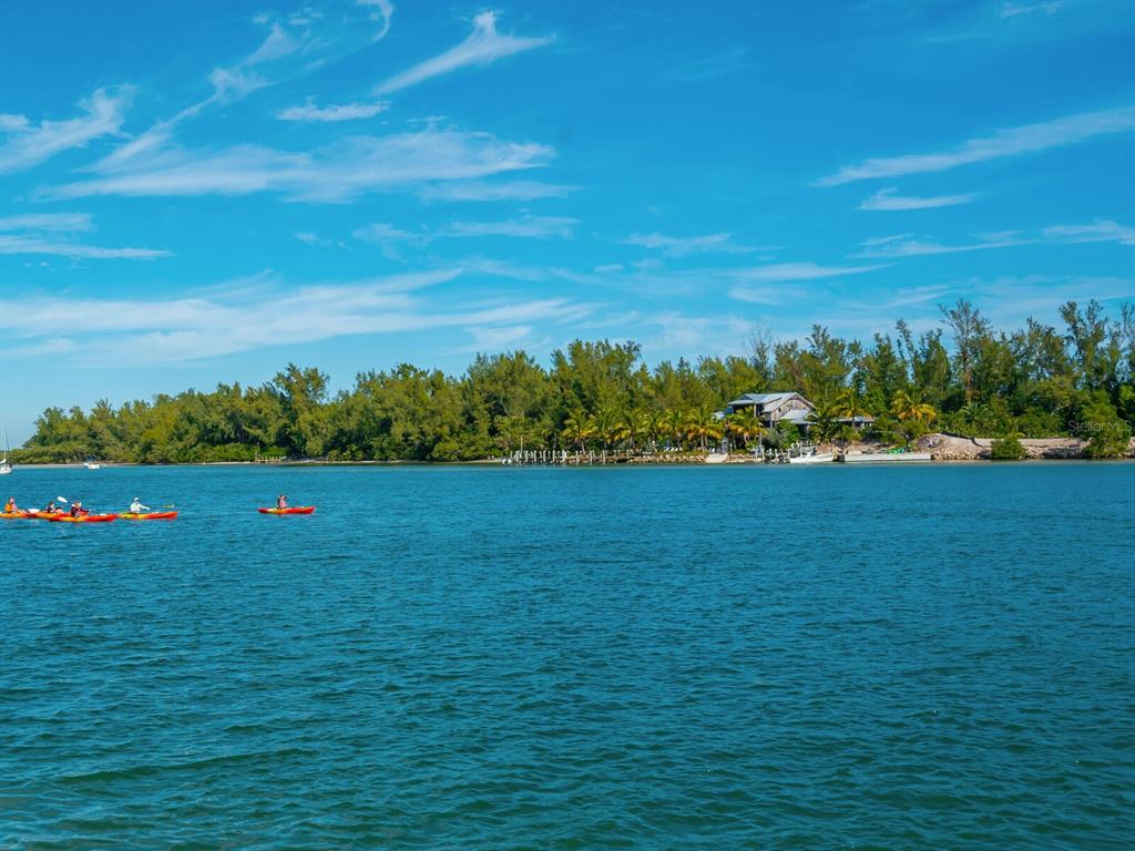 615 Buttonwood Drive Longboat Key, FL 34228 - Photo 40 of 43 a view of a green field