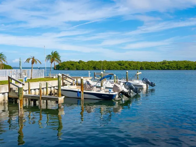 a view of swimming pool with outdoor seating