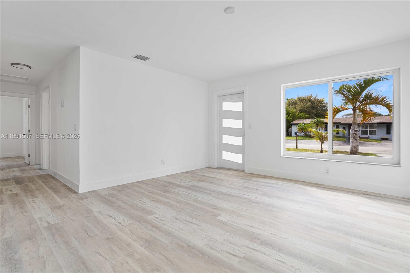 4157 Southwest 49th Court Dania Beach, FL 33314 - Photo 16 of 46 a view of an empty room with a window