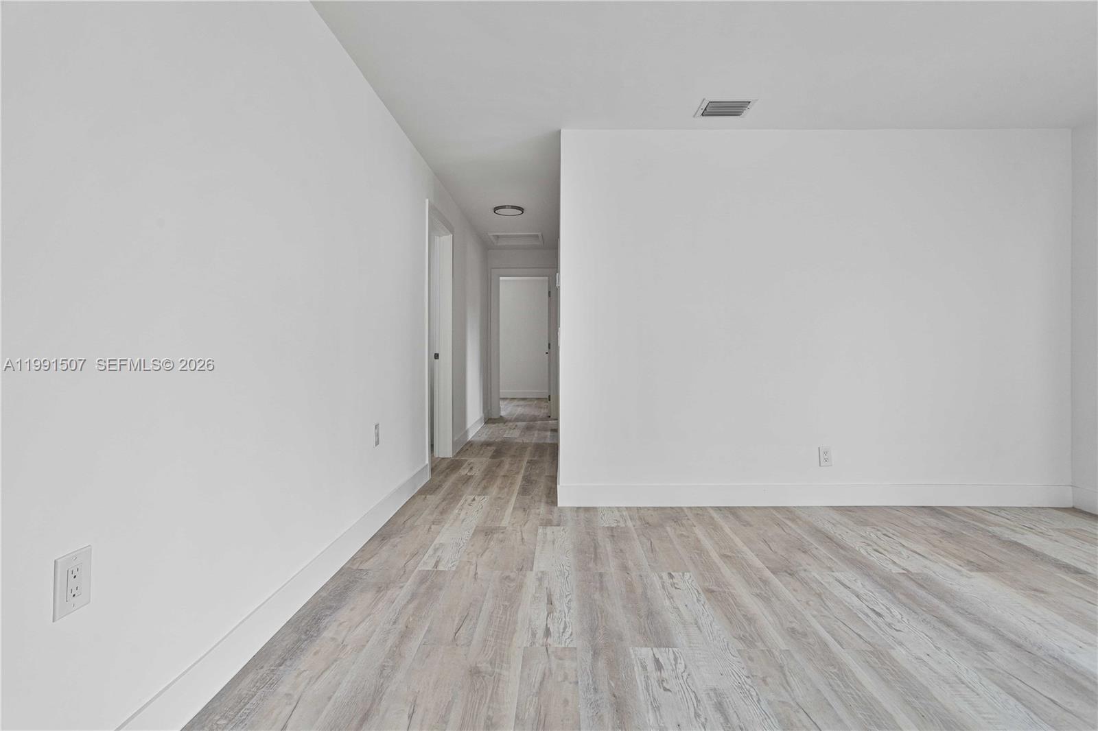 4157 Southwest 49th Court Dania Beach, FL 33314 - Photo 24 of 46 a view of a room with wooden floor