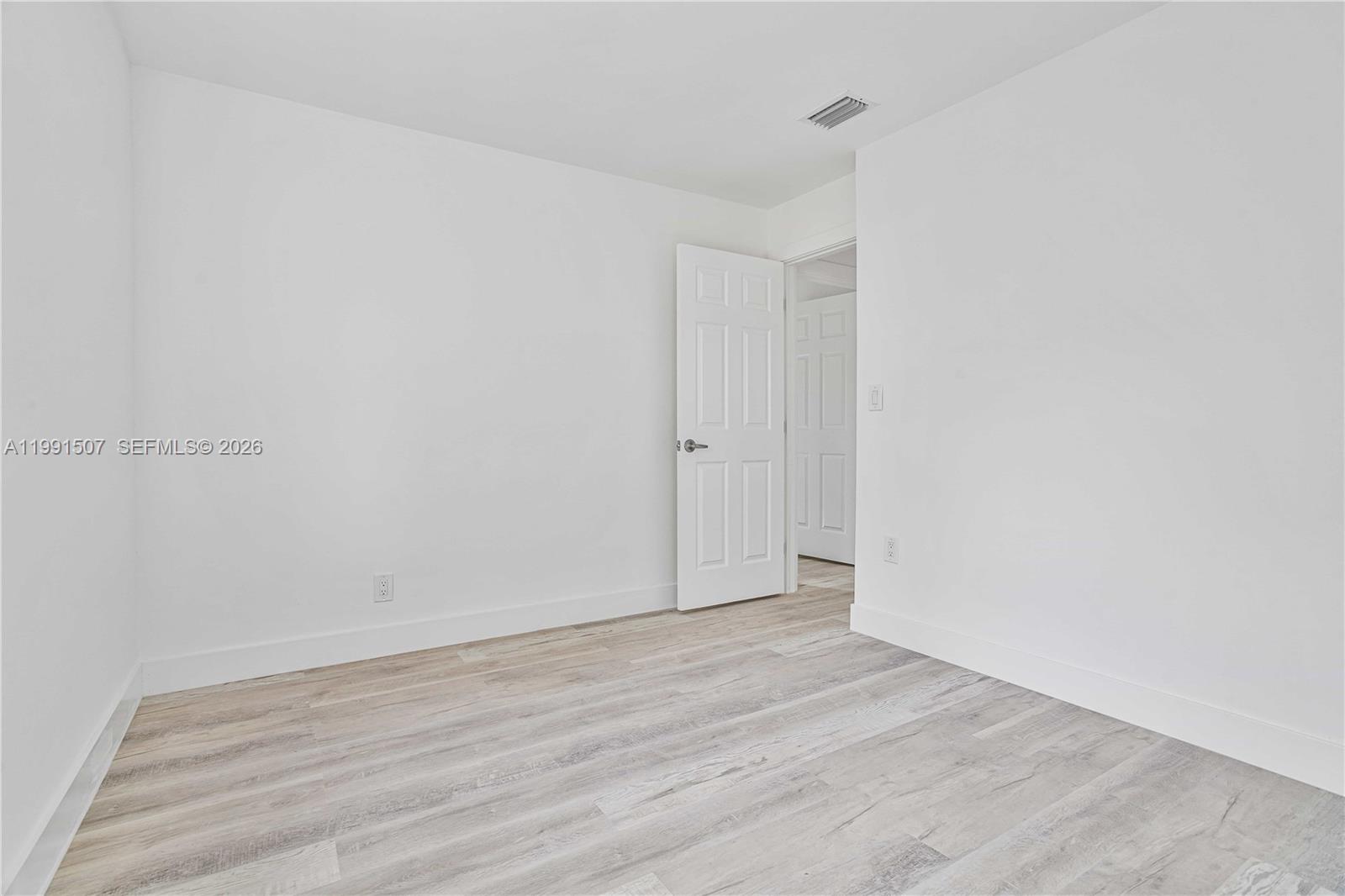 4157 Southwest 49th Court Dania Beach, FL 33314 - Photo 31 of 46 a view of an empty room