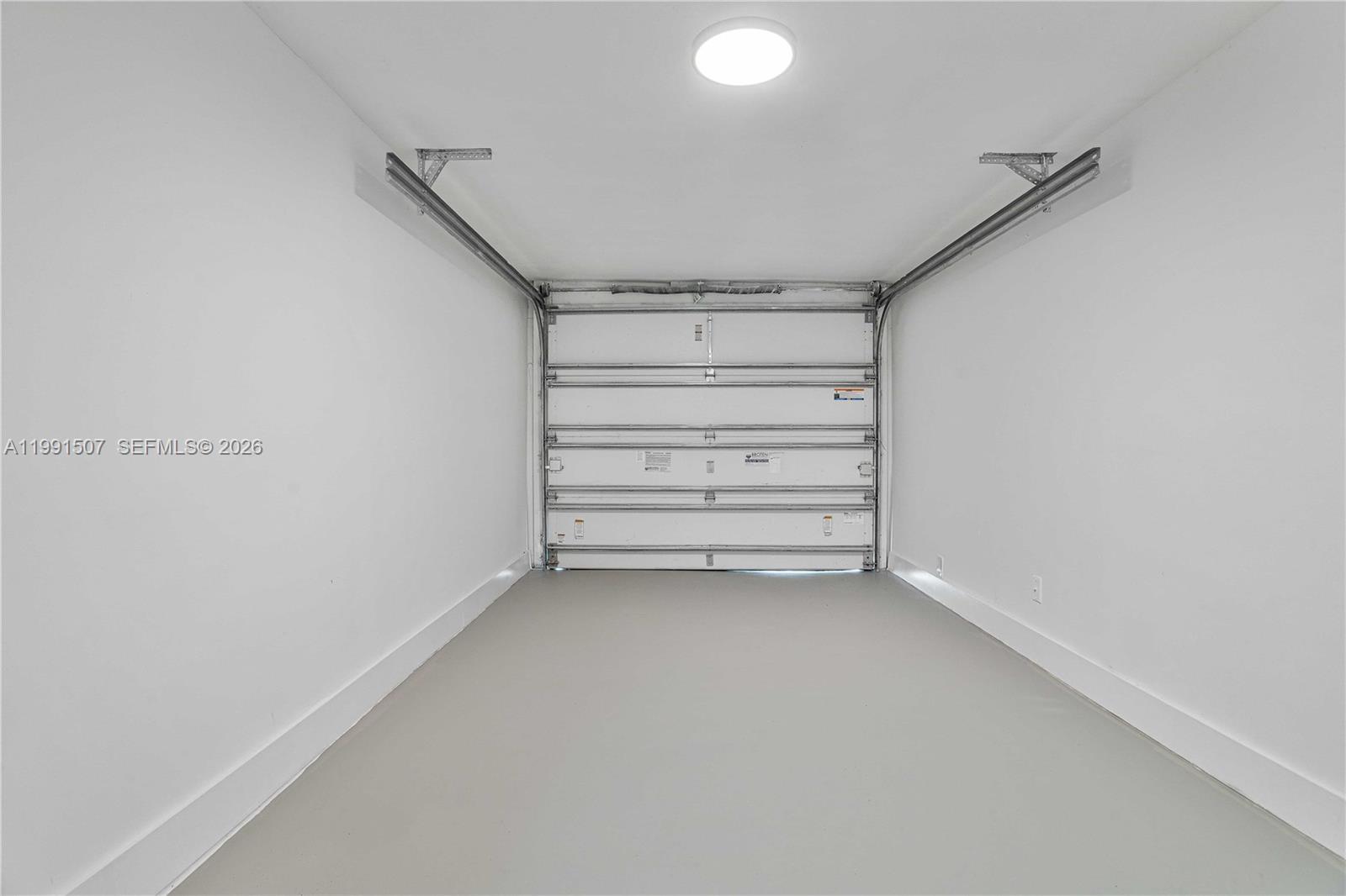 4157 Southwest 49th Court Dania Beach, FL 33314 - Photo 34 of 46 a view of walk in closet with empty racks
