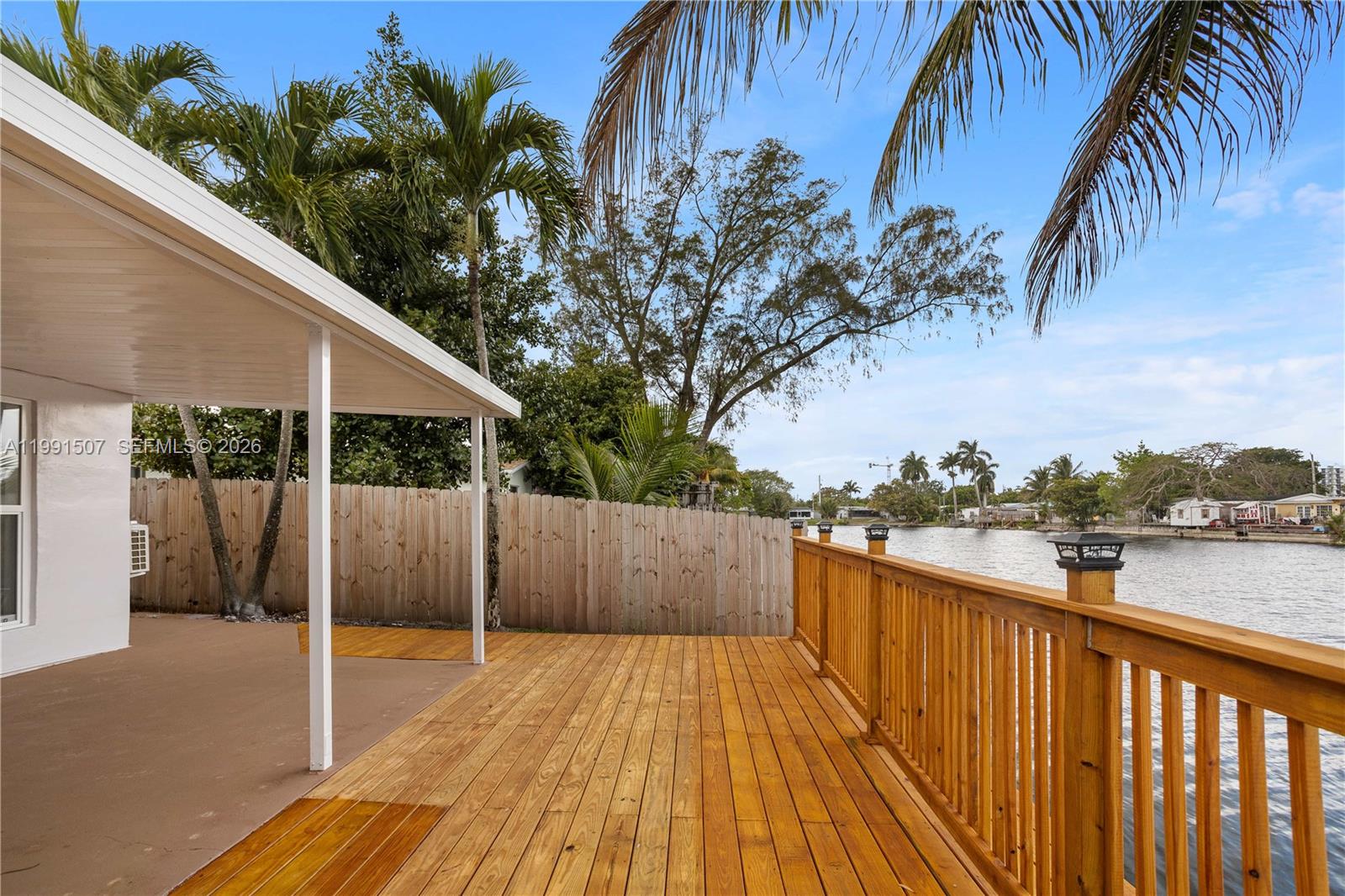 4157 Southwest 49th Court Dania Beach, FL 33314 - Photo 39 of 46 a view of a balcony with wooden floor