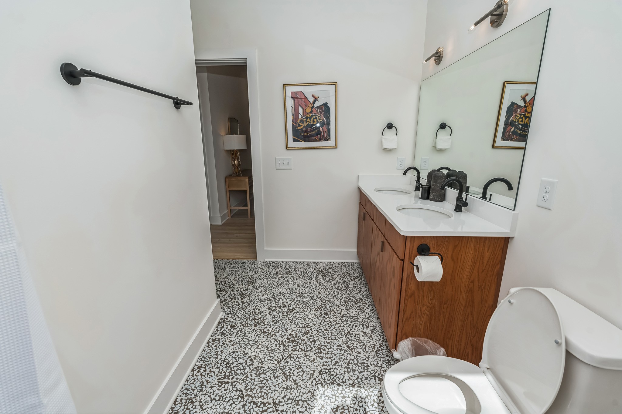 1310 Lischey Avenue, Unit 201 Nashville, TN 37207 - Photo 22 of 36 a bathroom with a sink toilet and vanity