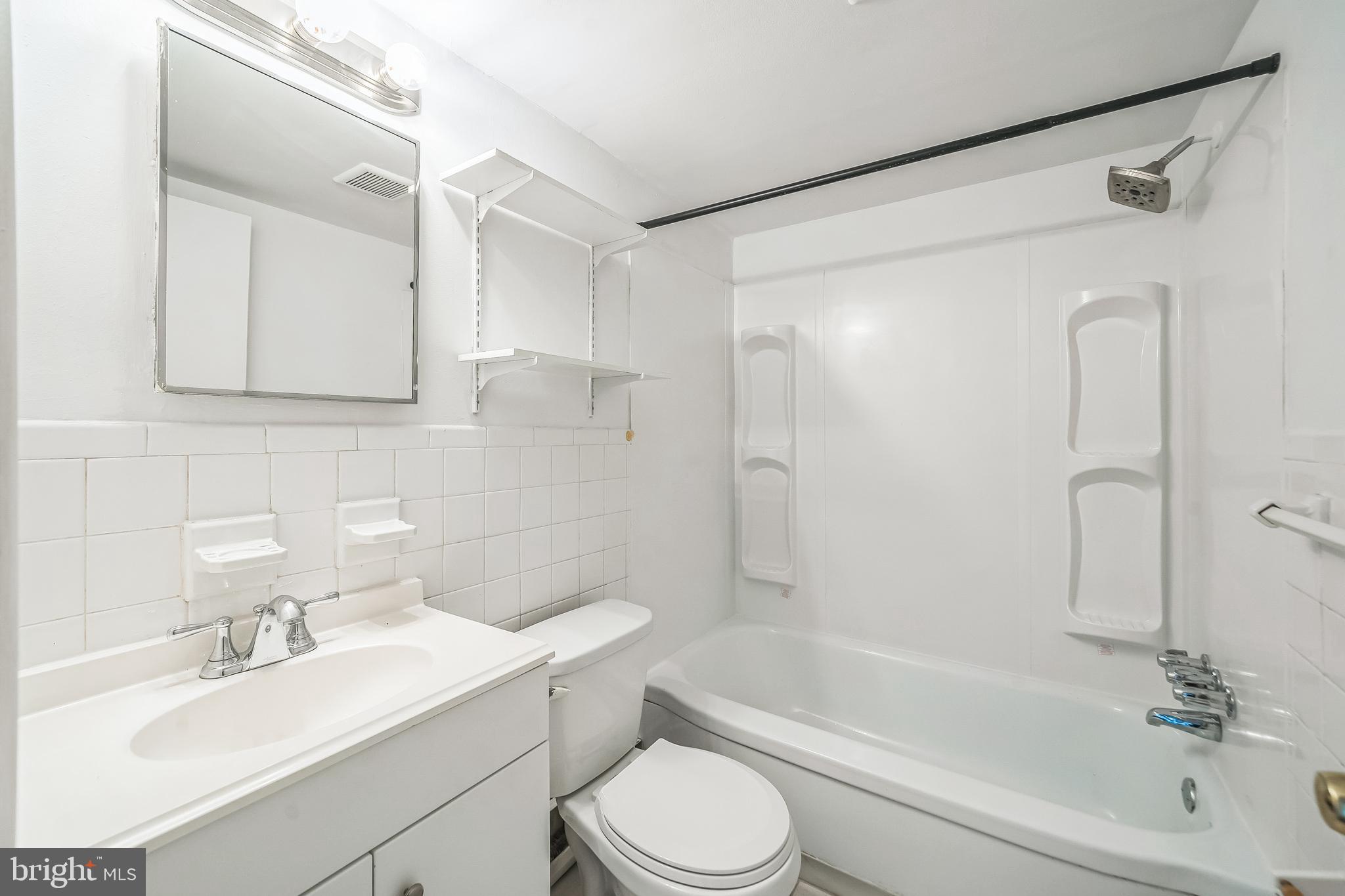 8115 West Chester Pike, Unit B5E Upper Darby, PA 19082 - Photo 11 of 29 Updated vanity