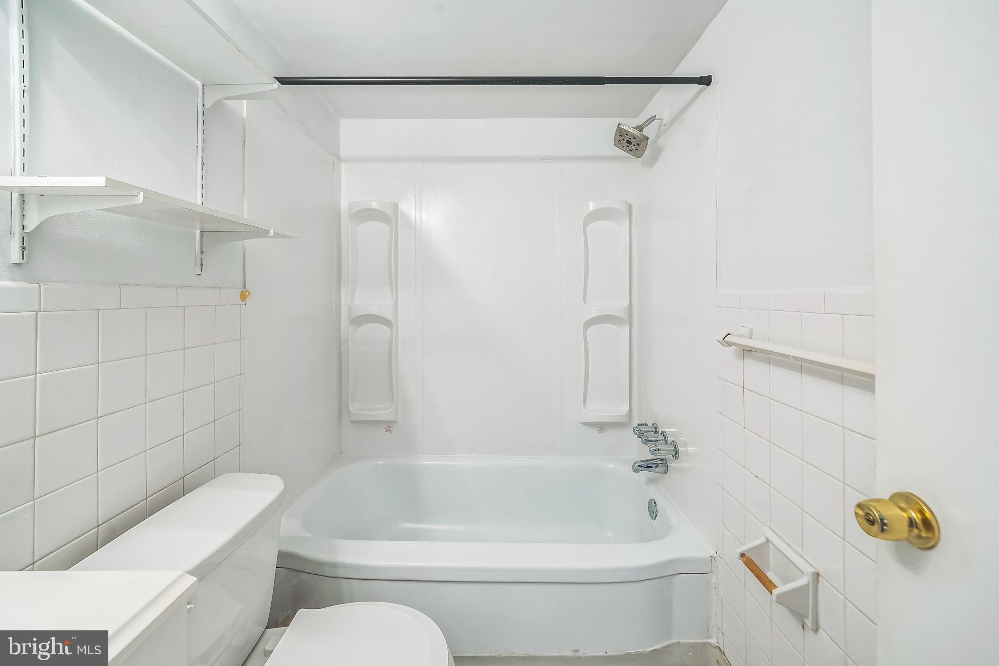 8115 West Chester Pike, Unit B5E Upper Darby, PA 19082 - Photo 12 of 29 Updated tub surround