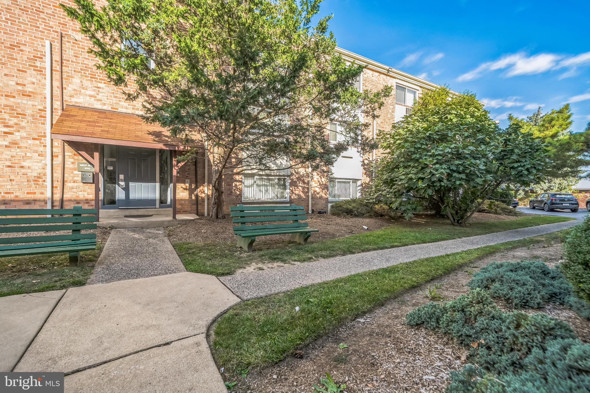 8115 West Chester Pike, Unit B5E Upper Darby, PA 19082 - Photo 24 of 29 Beautiful courtyard with benches
