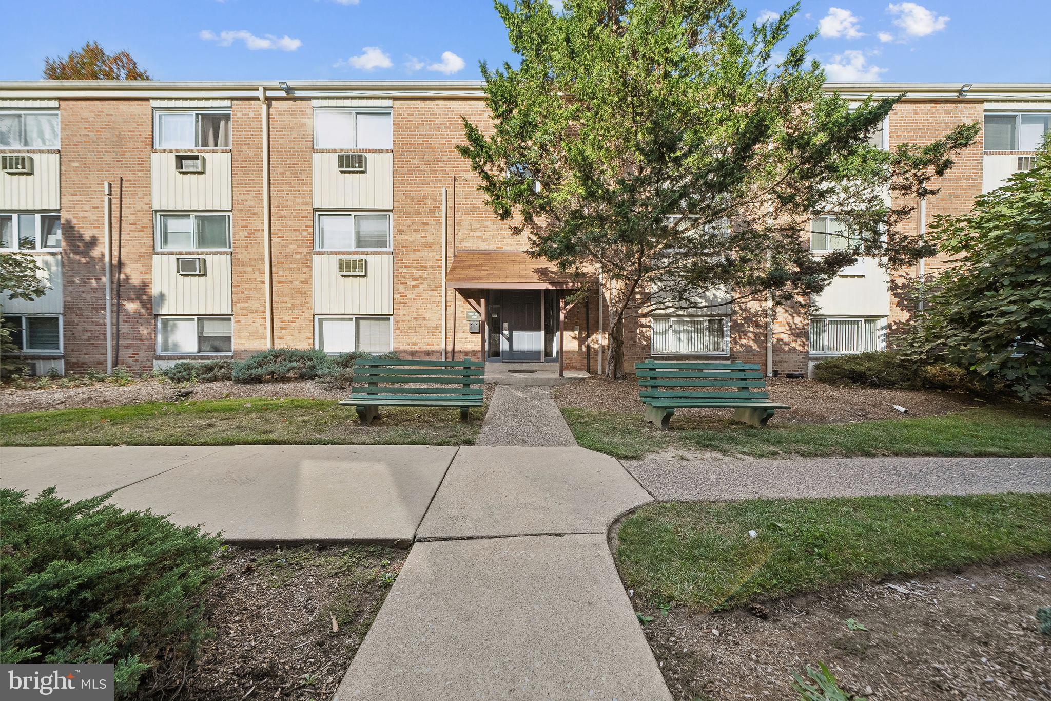 8115 West Chester Pike, Unit B5E Upper Darby, PA 19082 - Photo 25 of 29 Beautiful courtyard with well manicured trees