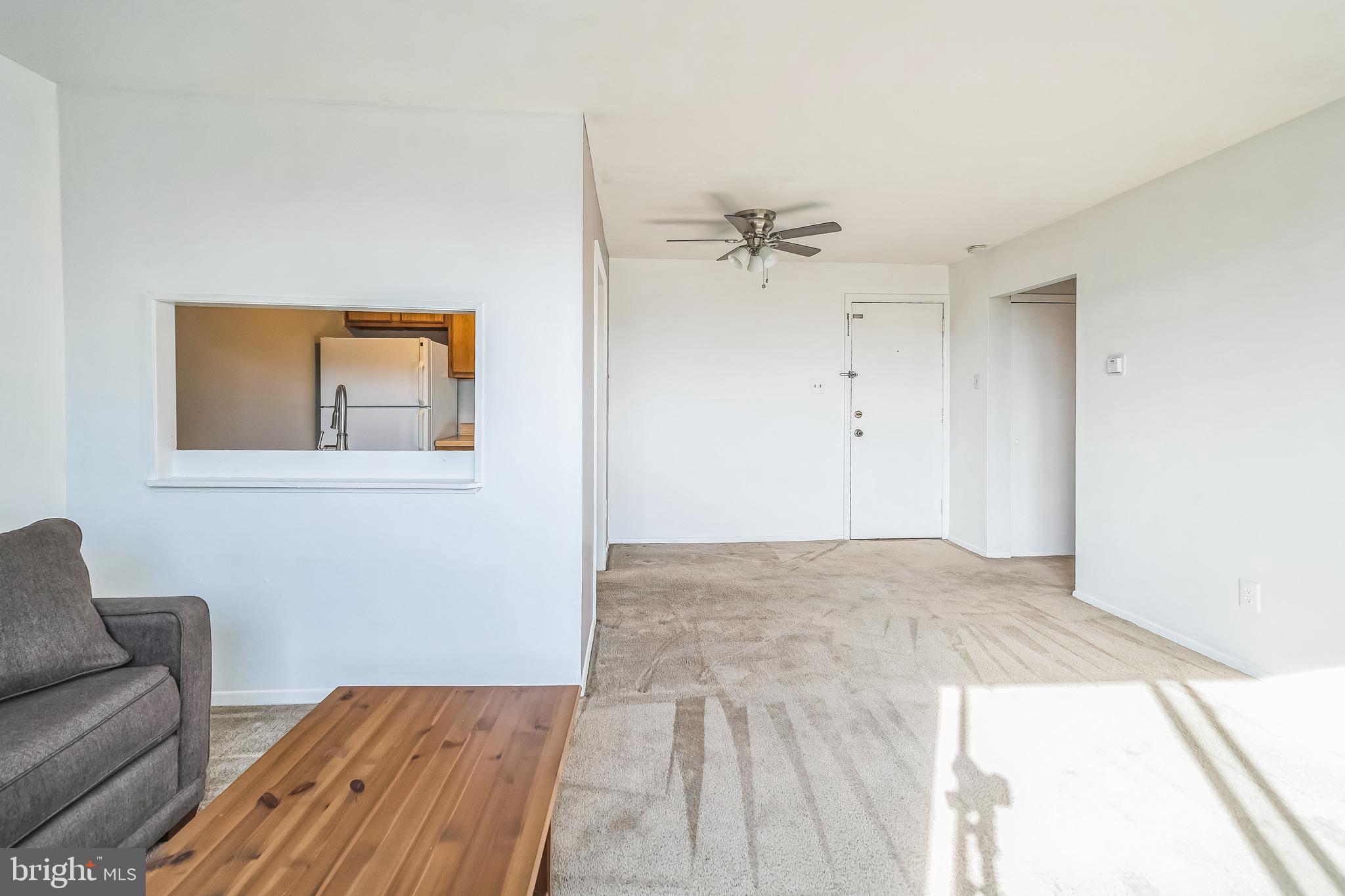 8115 West Chester Pike, Unit B5E Upper Darby, PA 19082 - Photo 4 of 29 Living/dining w/pass-thru into kitchen