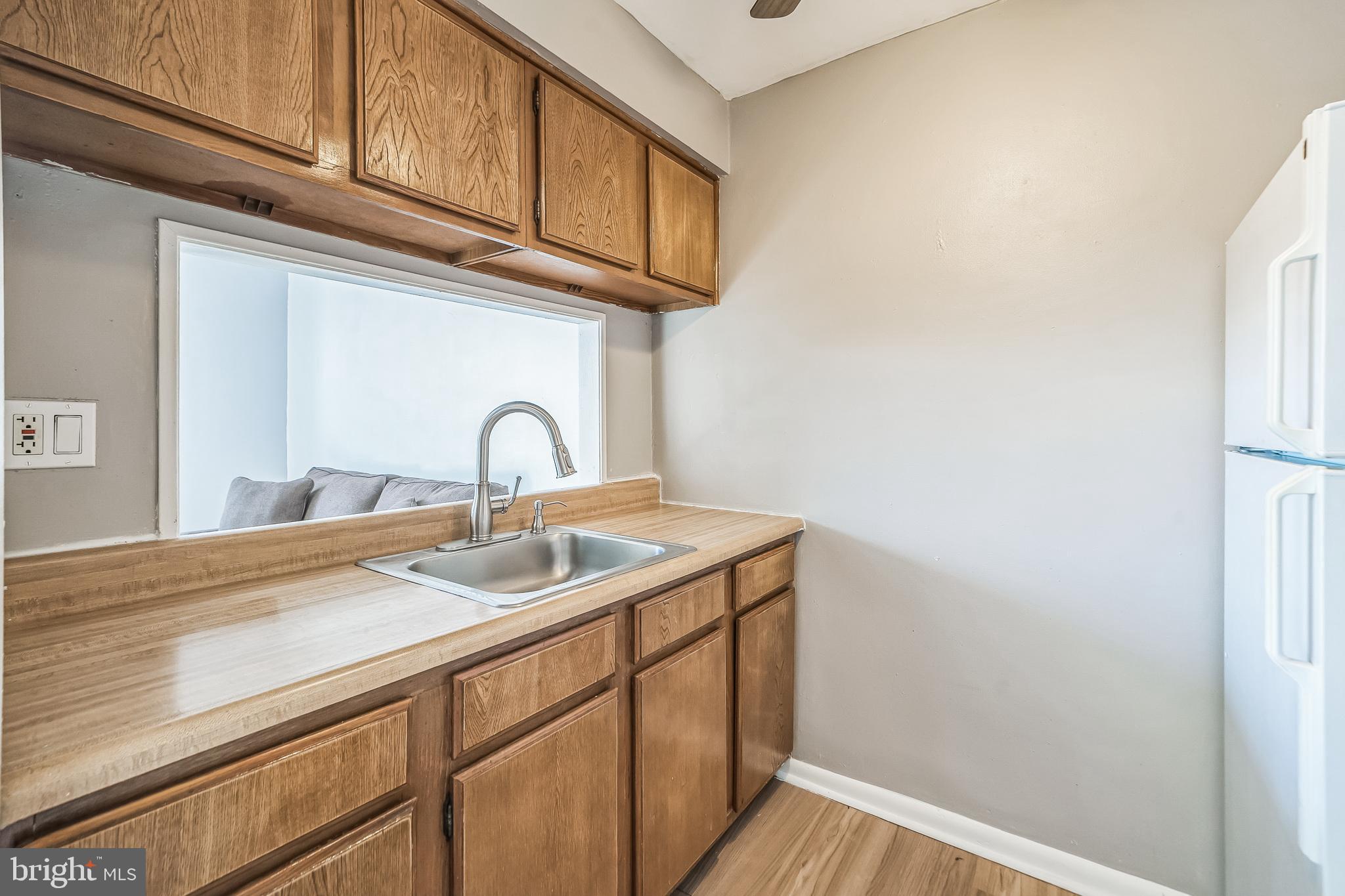 8115 West Chester Pike, Unit B5E Upper Darby, PA 19082 - Photo 9 of 29 Great light from the pass-thru