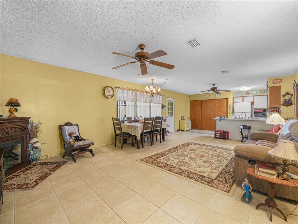 1100 Golden Bough Road Lake Wales, FL 33898 - Photo 16 of 49 a living room with furniture and a table