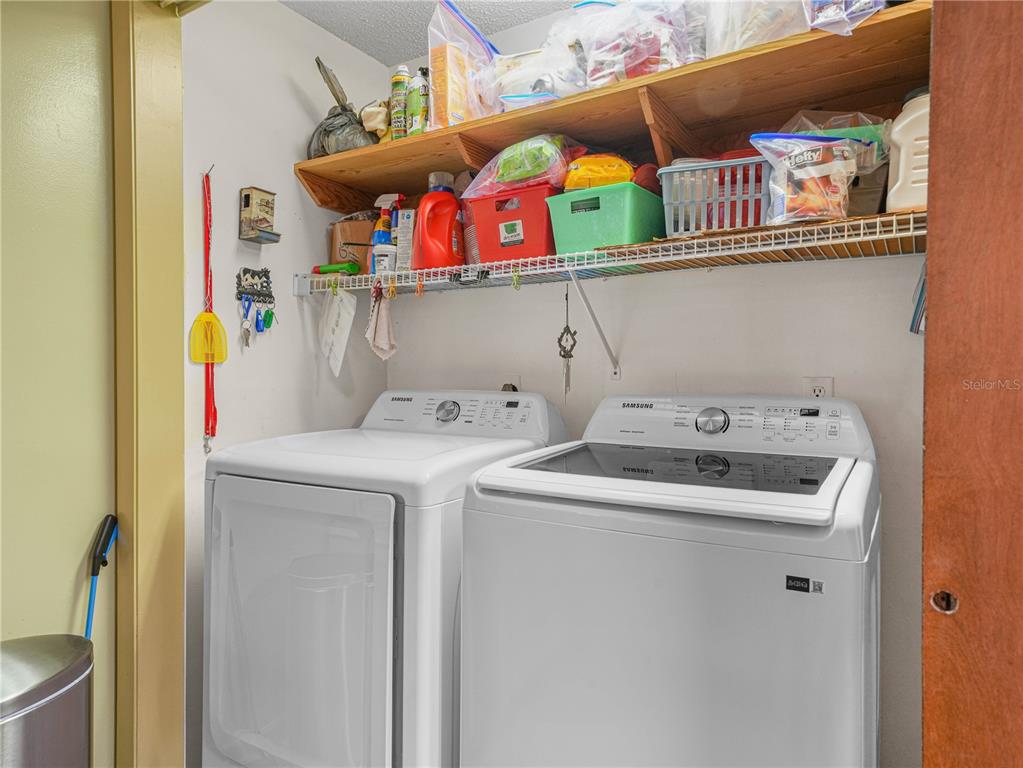 1100 Golden Bough Road Lake Wales, FL 33898 - Photo 17 of 49 a utility room with dryer and washer