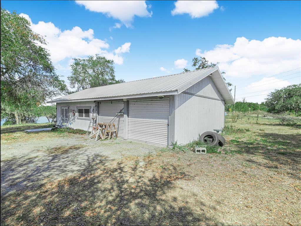 1100 Golden Bough Road Lake Wales, FL 33898 - Photo 3 of 49 a view of house with backyard