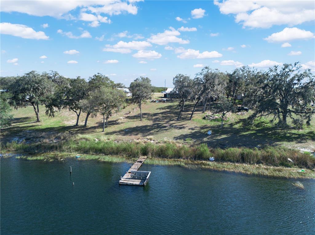 1100 Golden Bough Road Lake Wales, FL 33898 - Photo 7 of 49 a view of lake with green space