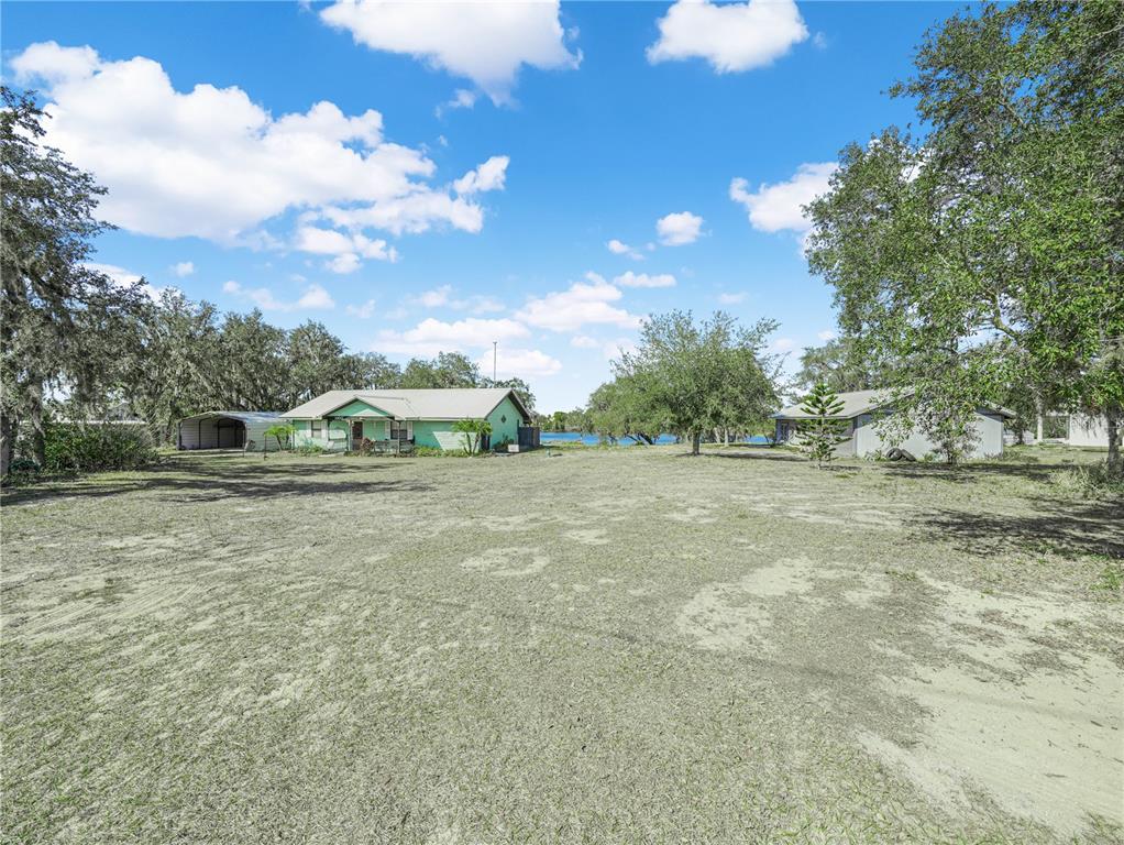 1100 Golden Bough Road Lake Wales, FL 33898 - Photo 8 of 49 a view of outdoor space with playground and green space