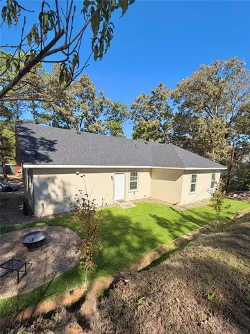 a view of backyard with green space
