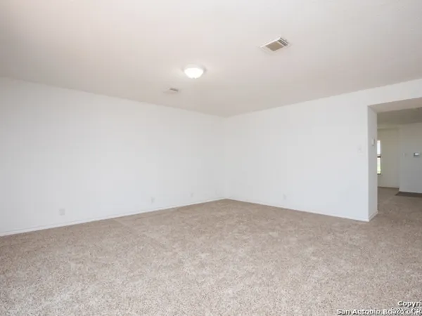 an empty room with an entryway