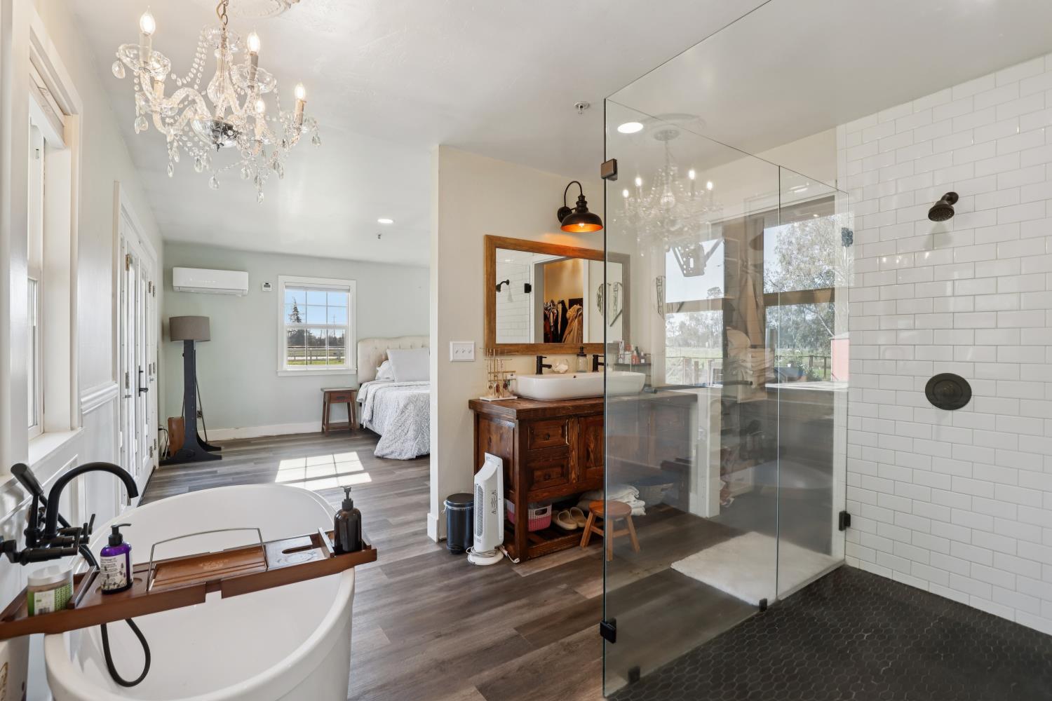 11213 Colony Road Wilton, CA 95693 - Photo 17 of 48 a very nice looking room with a large window and chandelier