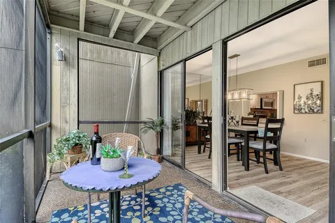 a bedroom with bed and a couch