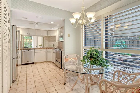 a view of a swimming pool with a yard