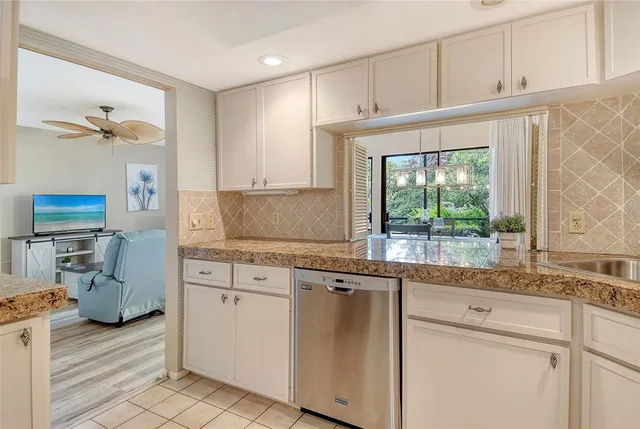 a view of a swimming pool with a lounge chairs
